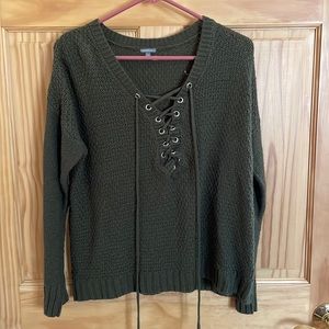Lightly worn green sweater